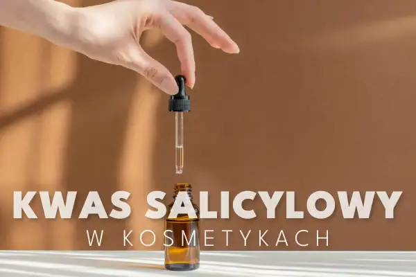 Dłoń trzyma pipetkę z serum, nad buteleczką. Czy kwas salicylowy jest szkodliwy w kosmetykach?